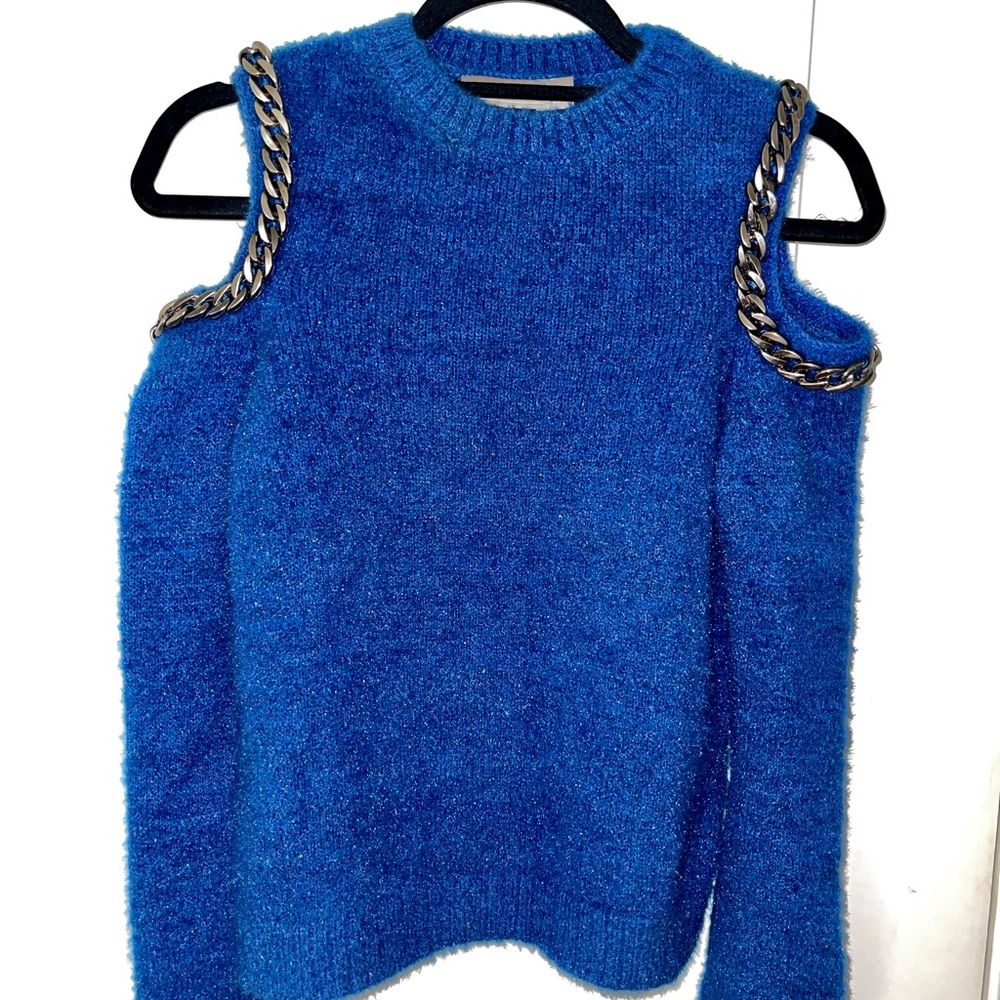 Cut out shoulder cobalt blue sweater with chain detail on the shoulder